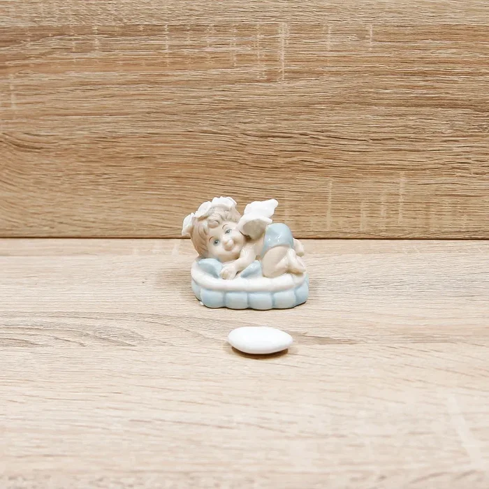 Angioletto su Cuscino Celeste Sconti